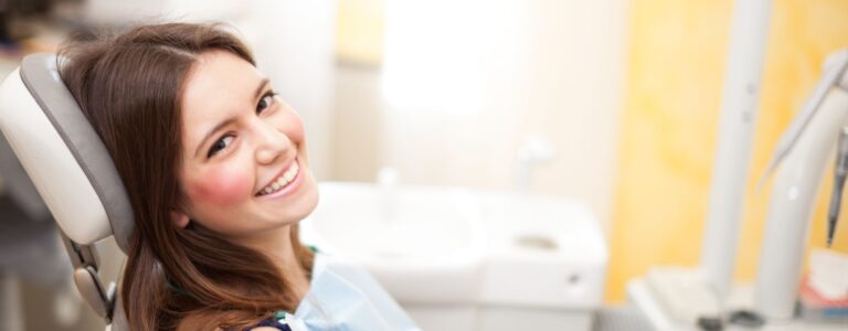 a woman at her first orthodontist appointment
