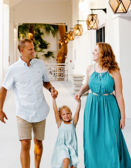 Dr. Amy Andrews with her husband and daughter
