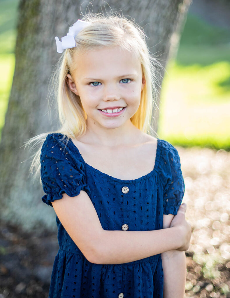 little girl wearing invisalign for kids